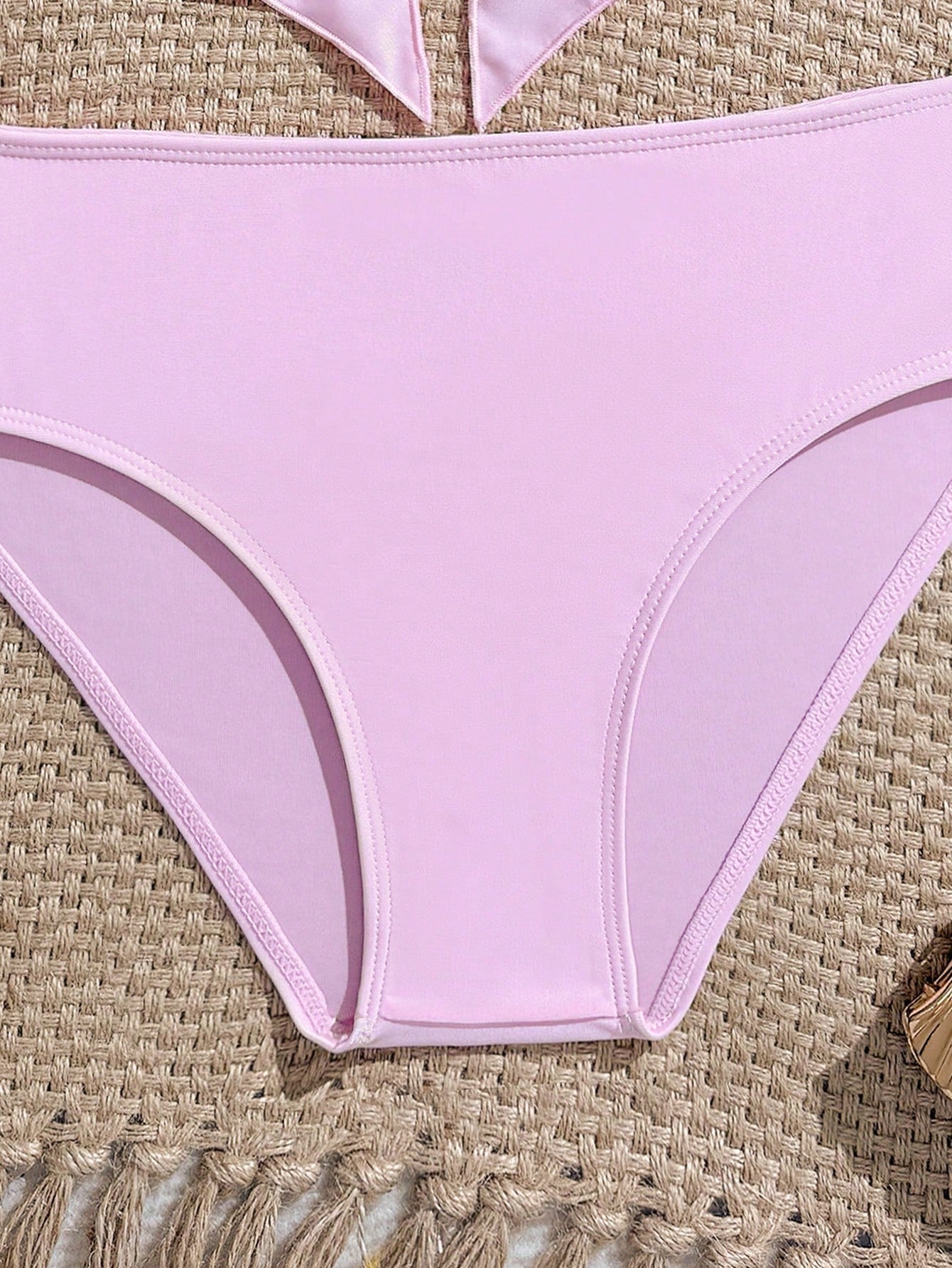 Tween girls two-piece tankini swimwear set with spaghetti straps, asymmetrical design, and 3D rose detail. Features a plant-pattern top and mid-waist bottoms in stretchy fabric for beach or pool wear.
