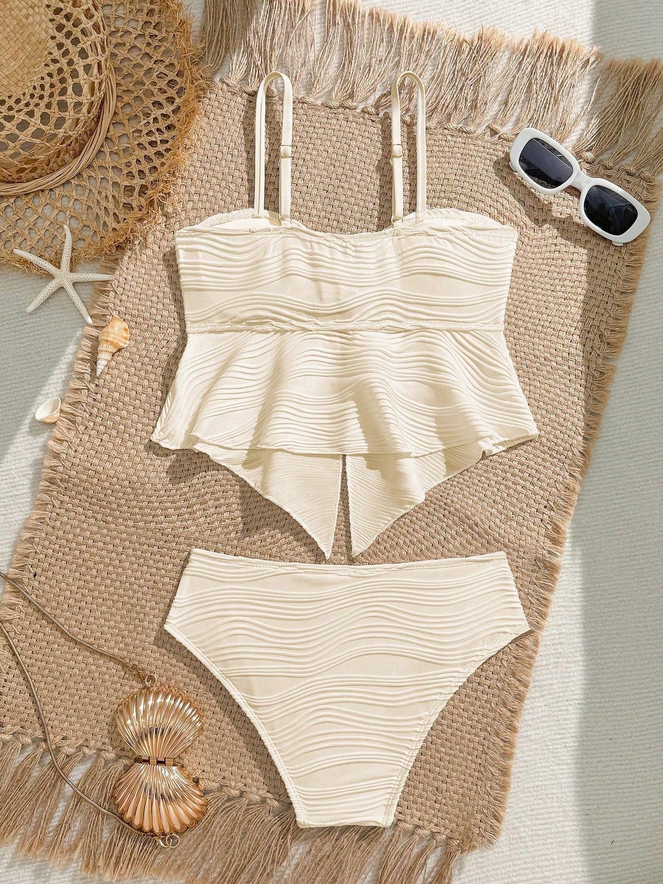 Tween girls two-piece tankini swimwear set with spaghetti straps, asymmetrical design, and 3D rose detail. Features a plant-pattern top and mid-waist bottoms in stretchy fabric for beach or pool wear.