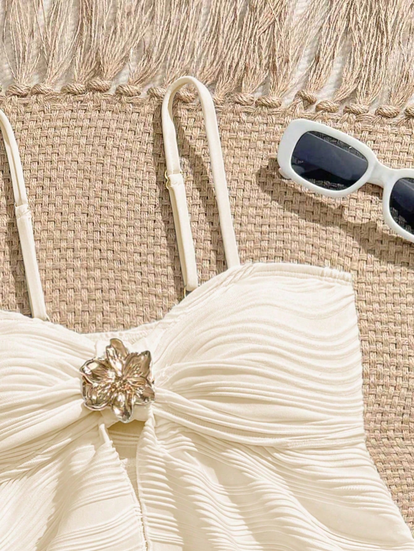 Tween girls two-piece tankini swimwear set with spaghetti straps, asymmetrical design, and 3D rose detail. Features a plant-pattern top and mid-waist bottoms in stretchy fabric for beach or pool wear.